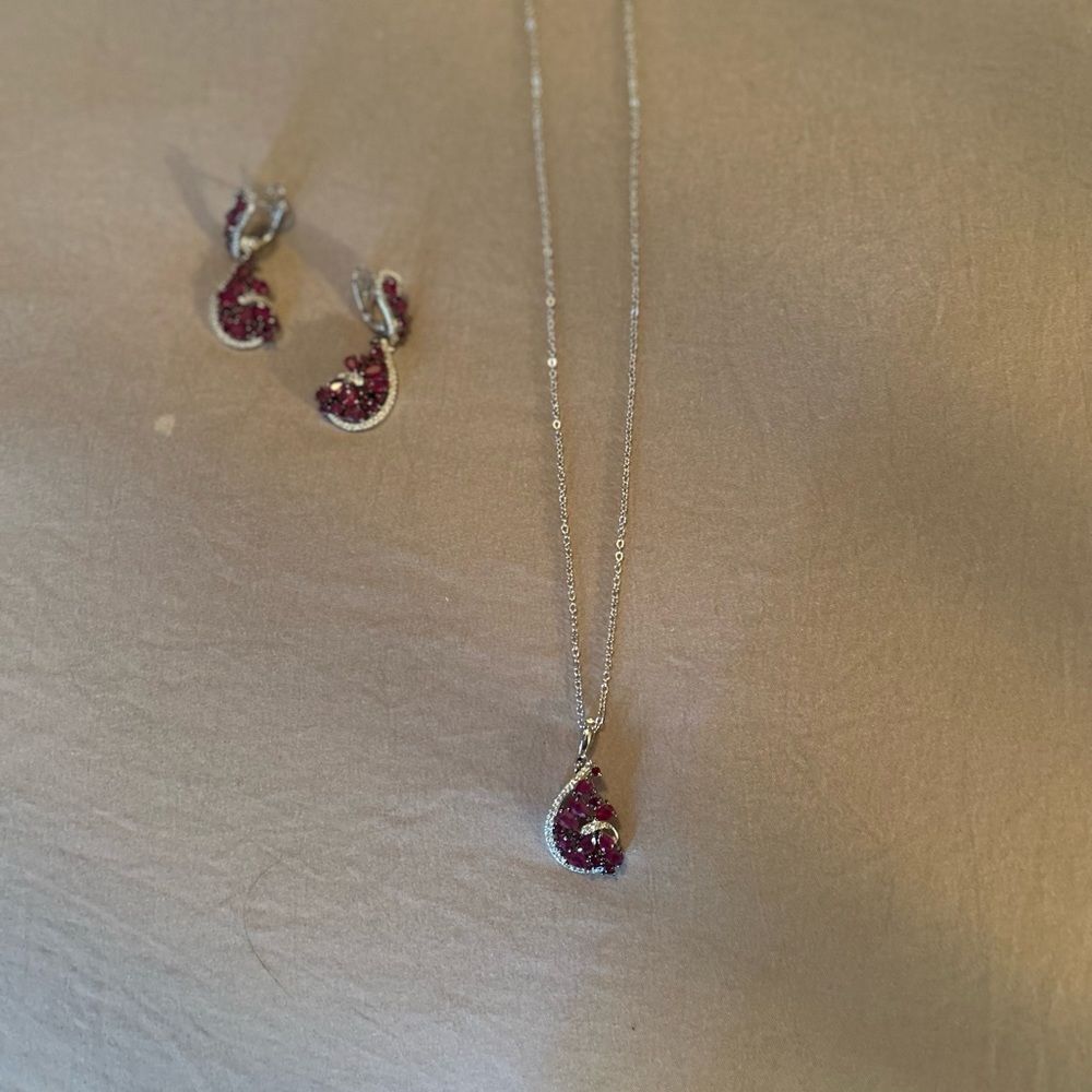 925 SS necklace and pierced earrings with diamonds and rubies. 18in chain.